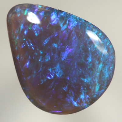 SOLID BLACK CRYSTAL OPAL Bright green sparkles in a 3D pattern
